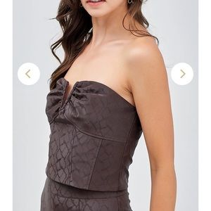 Strapless leather top. So so cute and fits so nicely